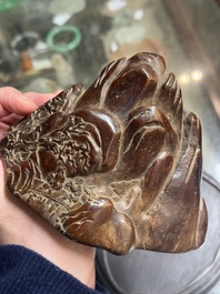 A Chinese agarwood carving of a mountain on wooden stand, 18/19th C.