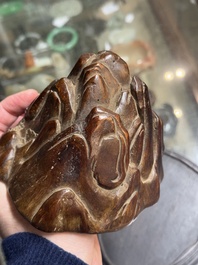 A Chinese agarwood carving of a mountain on wooden stand, 18/19th C.