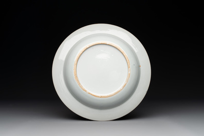 A pair of Chinese armorial monogrammed plates and a famille rose plate, Kangxi/Yongzheng