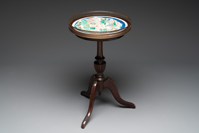 A Chinese famille verte powder-blue-ground 'qilin and phoenix' dish mounted as gu&eacute;ridon, Kangxi and later