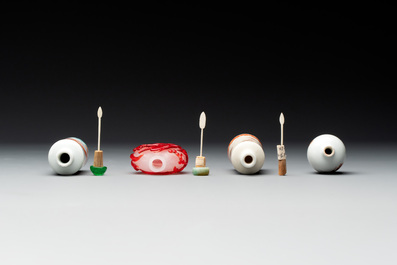 Three Chinese porcelain snuff bottles and a red Peking glass snuff bottle, Daoguang and Tongzhi mark, 19th C.