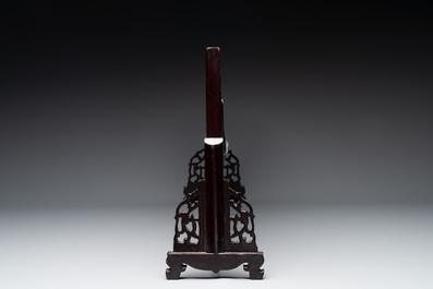 A Chinese wooden table screen with a carved stone 'dragon' plaque, 20th C.