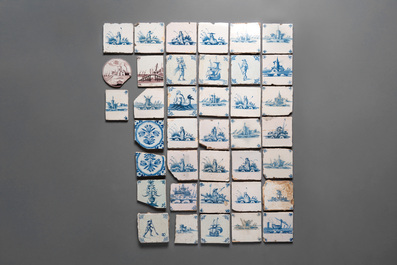 A collection of 80 mainly blue and white Dutch Delft tiles, 17/18th C.