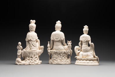 Three Chinese Dehua blanc de Chine sculptures of Guanyin, 20th C.