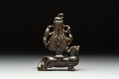 Three Chinese jade vases and covers, 20th C.