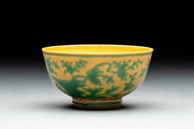 A Chinese yellow-ground 'birds and peaches' bowl, Guangxu mark and possibly of the period