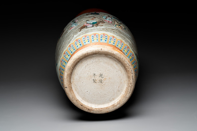 A large Chinese famille rose coral-red-ground  'Eight Immortals' vase, Qianlong mark, 19th C.