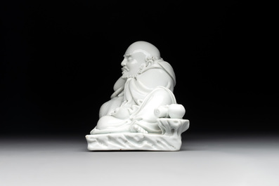A Chinese Dehua blanc de Chine figure of a Luohan reclining on a tiger, Dehua and Bo Ji Yu Ren 博及漁人 mark, 20th C.