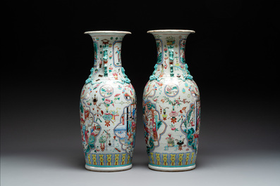 A pair of Chinese famille rose vases with narrative design, 19th C.