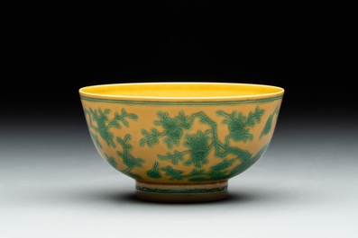 A Chinese yellow-ground 'birds and peaches' bowl, Guangxu mark and possibly of the period