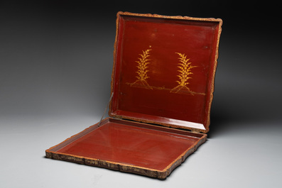 A large Chinese Canton gilt-lacquered garment box with landscape and figural design, 19th C.