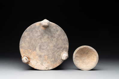 A Chinese terracotta tripod storage vessel, Han or later