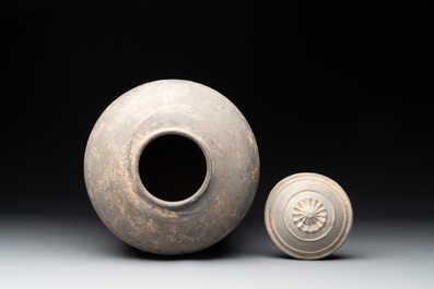 A Chinese terracotta tripod storage vessel, Han or later