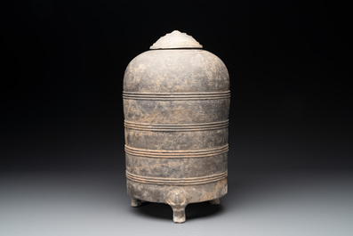 A Chinese terracotta tripod storage vessel, Han or later