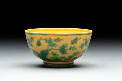 A Chinese yellow-ground 'birds and peaches' bowl, Guangxu mark and possibly of the period