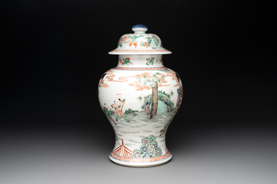 A Chinese famille verte 'ladies and boys' vase and cover, Kangxi