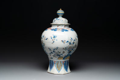 A large polychrome Dutch Delft baluster vase and cover, late 17th C.