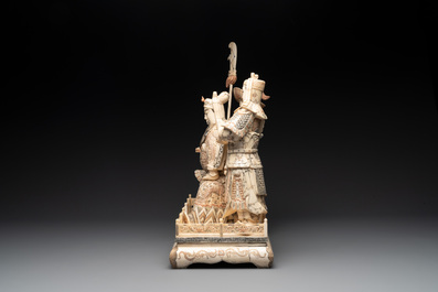 A Chinese bone-veneered group of Guandi and his attendents, 20th C.