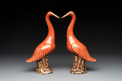 A pair of Chinese white-glazed Buddhist lions, a pair of doves and a pair of iron-red-decorated cranes, Ming and later