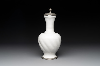 A pewter-mounted white Dutch Delftware jug, 17th C.