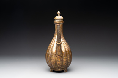 A Mughal bronze fluted jug or aftaba, 18/19th C.