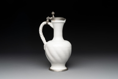 A pewter-mounted white Dutch Delftware jug, 17th C.