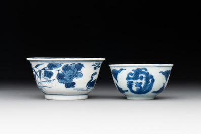 Two Chinese blue and white cups and saucers, Kangxi/Yongzheng