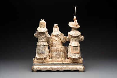 A Chinese bone-veneered group of Guandi and his attendents, 20th C.