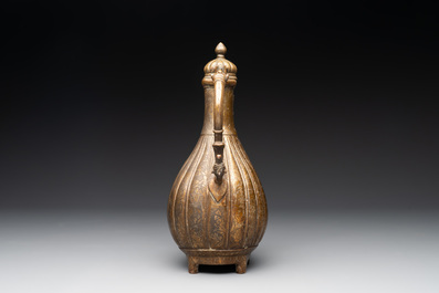 A Mughal bronze fluted jug or aftaba, 18/19th C.