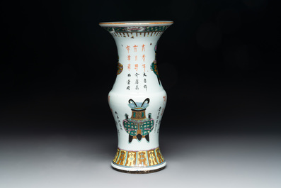 Three Chinese famille rose vases, one with cover, signed Wu Yu 吴玉, dated 1912