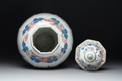 A large polychrome Dutch Delft baluster vase and cover, late 17th C.