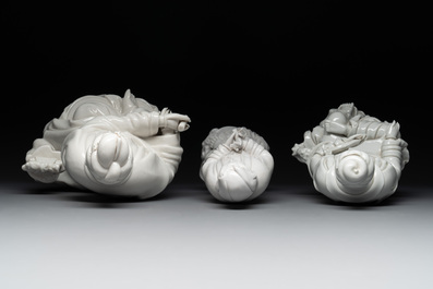 Three Chinese Dehua blanc de Chine figures of Guanyin, 20th C.