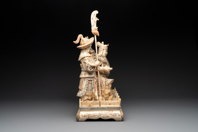 A Chinese bone-veneered group of Guandi and his attendents, 20th C.