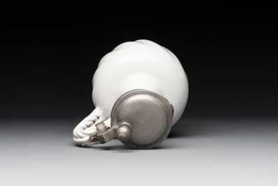 A pewter-mounted white Dutch Delftware jug, 17th C.
