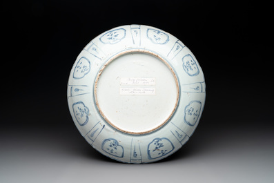 A Chinese blue and white 'kraak' dish with two magpies and peonies, Wanli