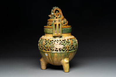 A Chinese sancai-glazed reticulated double-walled tripod censer and cover, Ming