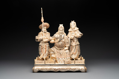 A Chinese bone-veneered group of Guandi and his attendents, 20th C.