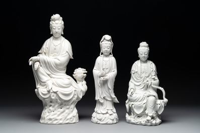 Three Chinese Dehua blanc de Chine figures of Guanyin, 20th C.