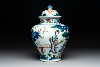 A Chinese wucai vase and cover with court ladies and playing boys, Transitional period