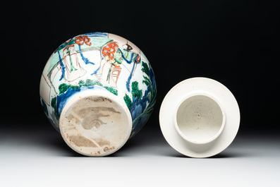 A Chinese wucai vase and cover with court ladies and playing boys, Transitional period