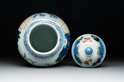 A Chinese wucai vase and cover with court ladies and playing boys, Transitional period