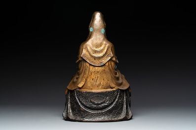 A Chinese parcel-gilt bronze Guanyin and a pair of Bodhisattvas, 20th C.