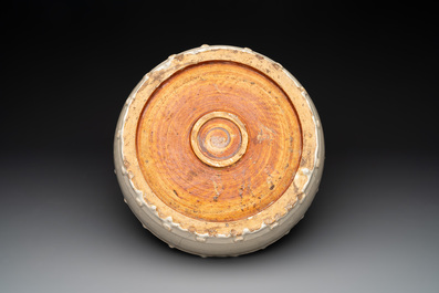 A large Chinese cream-glazed drum-shaped basin, Ming