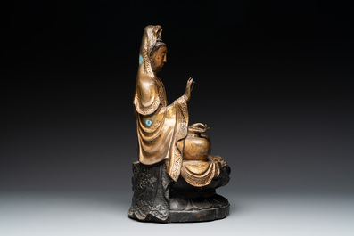 A Chinese parcel-gilt bronze Guanyin and a pair of Bodhisattvas, 20th C.