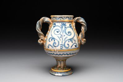 An Italian maiolica rope twist handle drug jar, probably Southern Italy, late 16th C.