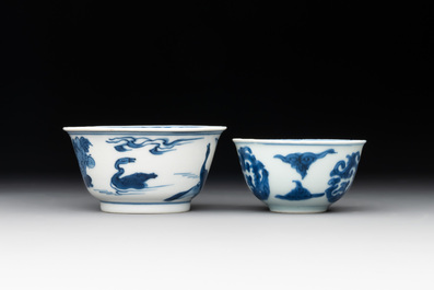 Two Chinese blue and white cups and saucers, Kangxi/Yongzheng