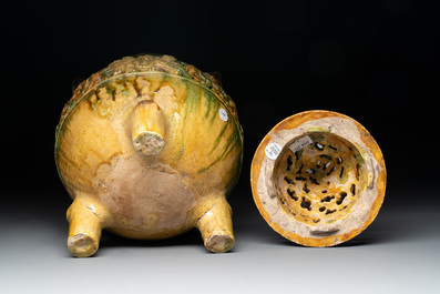 A Chinese sancai-glazed reticulated double-walled tripod censer and cover, Ming