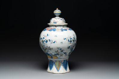 A large polychrome Dutch Delft baluster vase and cover, late 17th C.