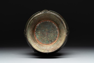 A Chinese archaistic gold- and silver-inlaid bronze vase with pseudo-rust patina, 19th C.