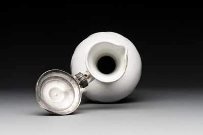 A pewter-mounted white Dutch Delftware jug, 17th C.